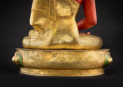 Detailed landscape shot back of Amitabha Buddha showing dharma wheel and deer