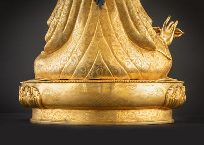 Detailed landscape shot of Guru Rinpoche seated on lotus back view
