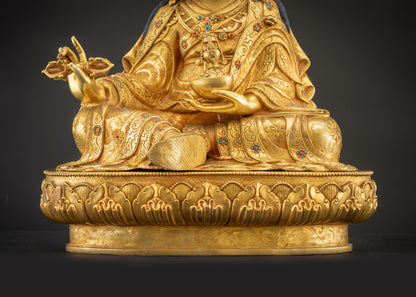 Detailed landscape shot of Guru Rinpoche seated on lotus front view
