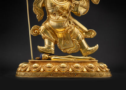 Detailed landscape shot of Nechung Chuyong Statue seated on lotus seat front view