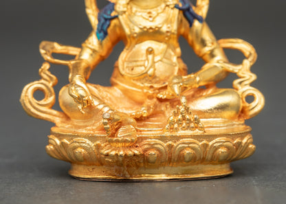 Detailed lotus seat base of Dzambhala Buddhist wealth god statue crafted with electroplating technique