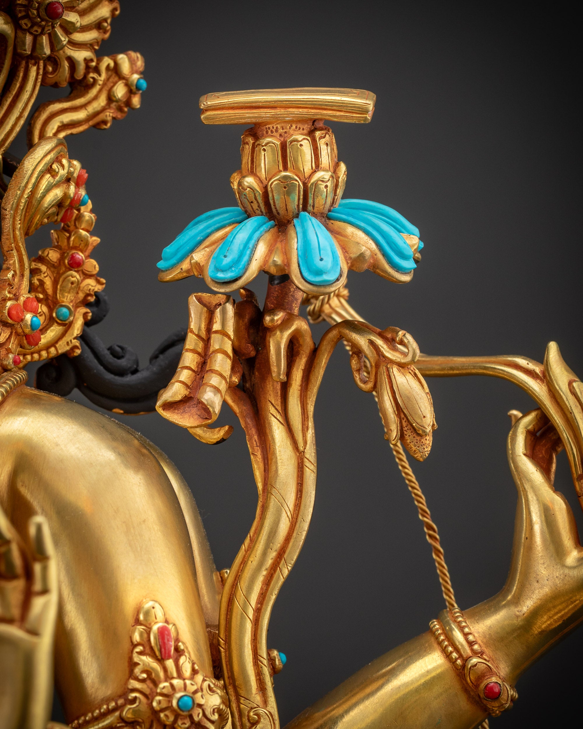 Detailed shot Maha Manjushri Statue utpala flower with Prajnaparamita Sutra Adorned with semi-precious Stones