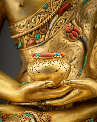 Detailed shot of Amitabha Buddha monk’s bowl in dhyana mudra, 24K gold-gilded finish
