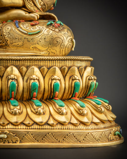 Detailed shot of Amitabha Buddha seated on double-layered lotus seat with dharma wheel
