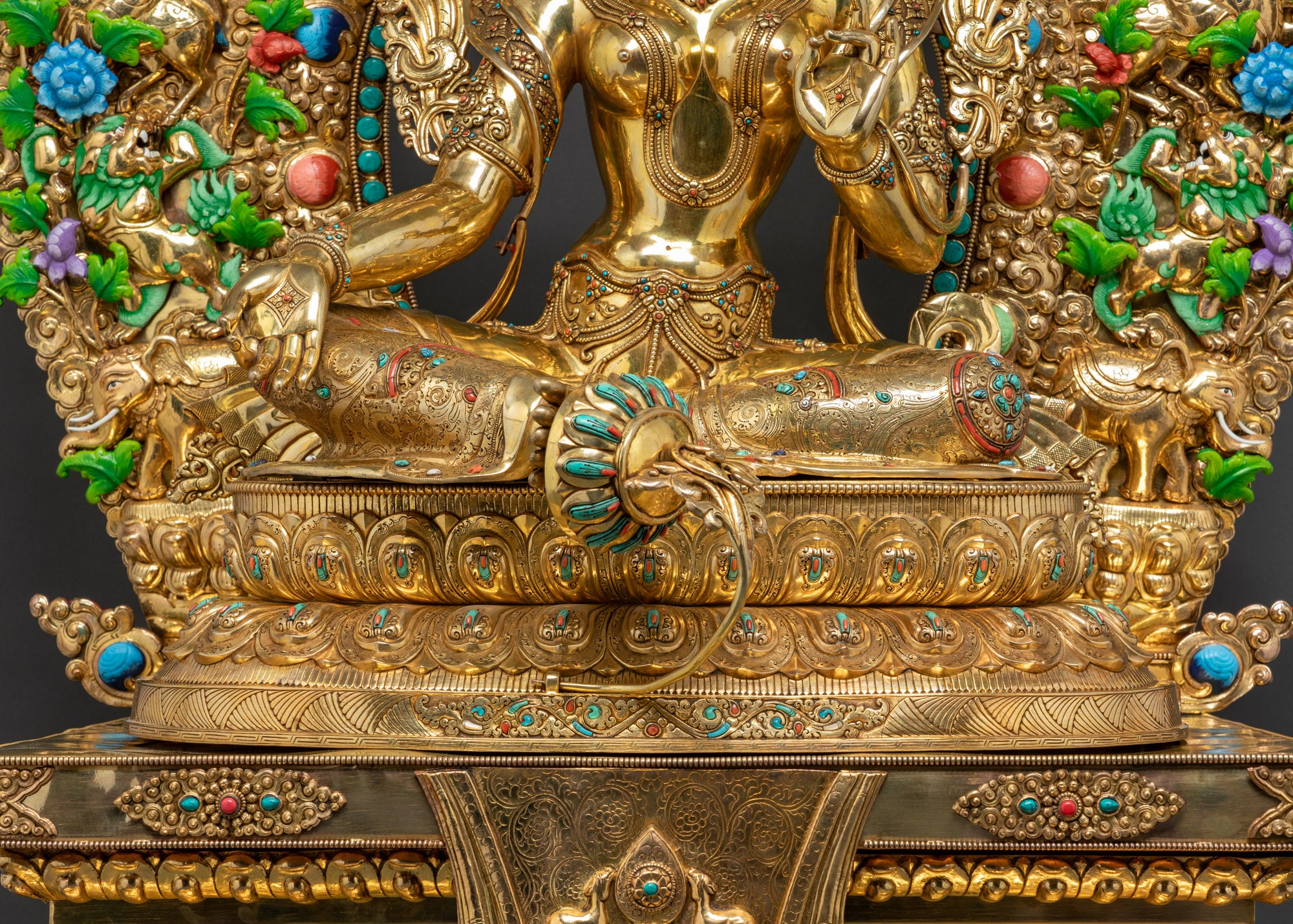 Detailed shot of Green Tara Statue seated on double-layered lotus seat
