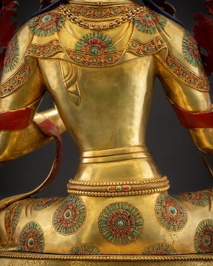 Detailed shot of Green Tara deity Statue robes with semi-precious stones and gold fire-gilding