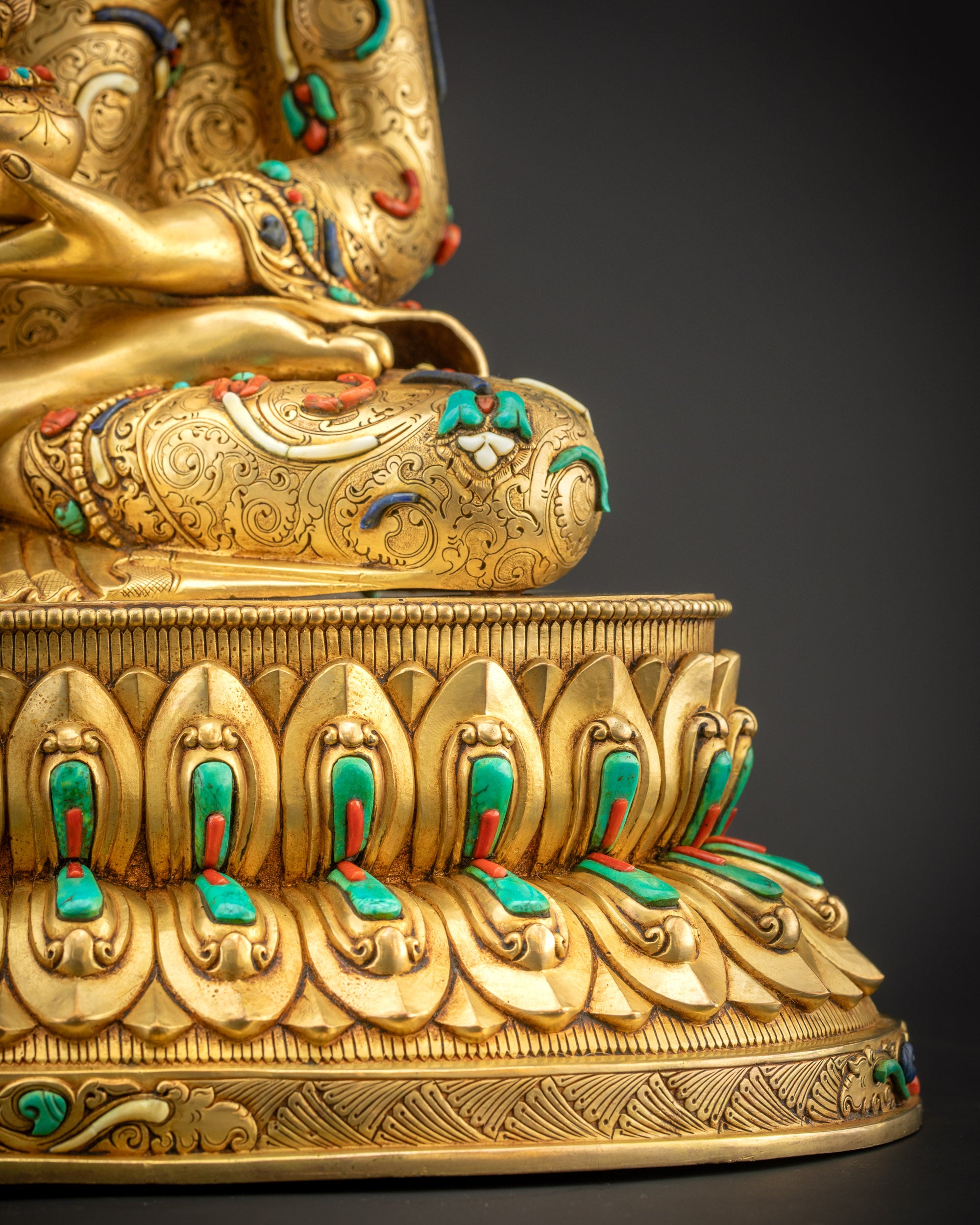 Detailed shot of Medicine Buddha seated on double-layered lotus seat showing full posture