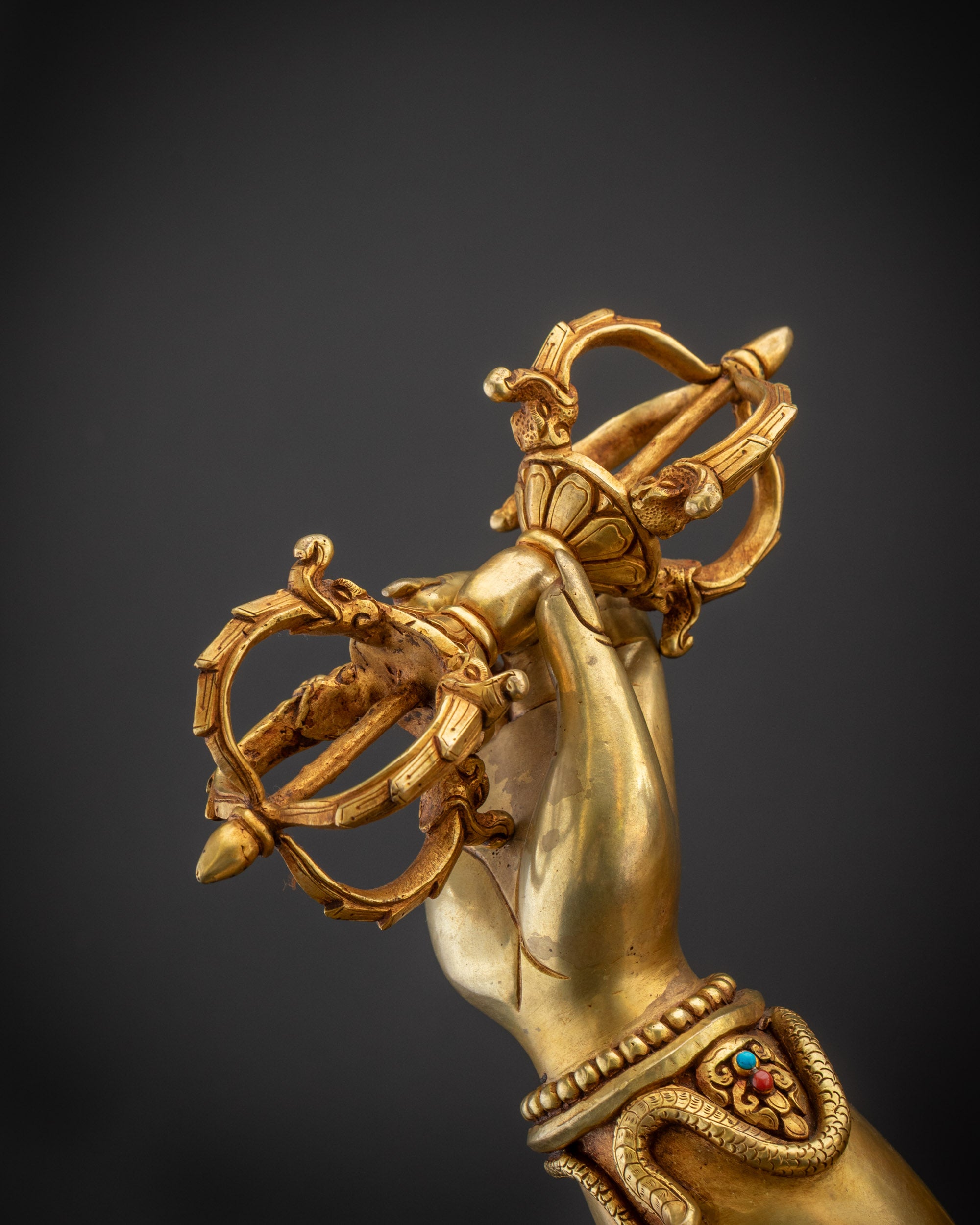 Detailed shot of Vajrapani Statue dorje highlighting precise craftsmanship
