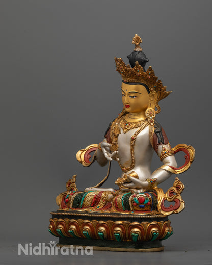 Detailed shot of five-jewel crown and intricate lotus base on 24k gold-gilded