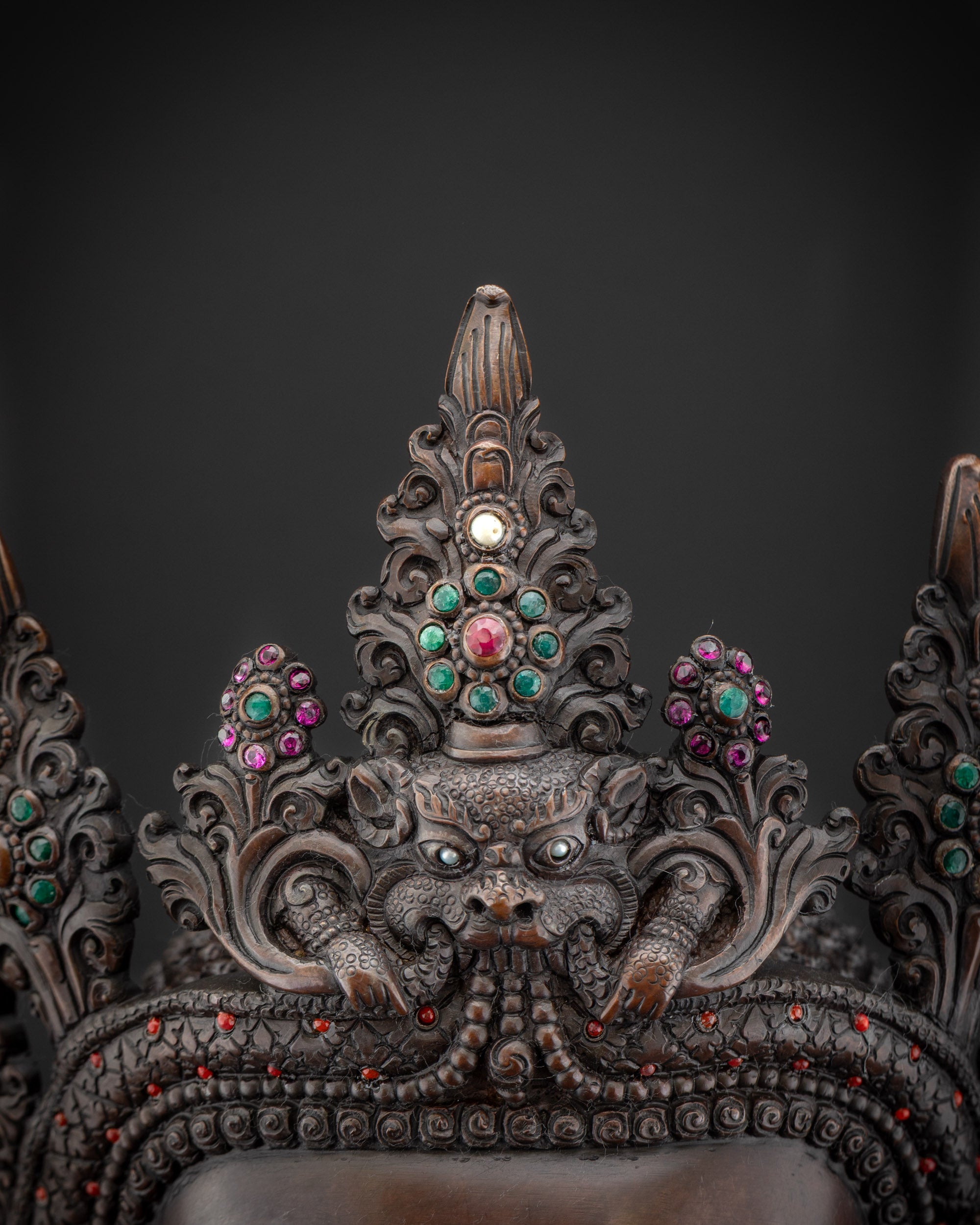Detailed shot of five-jeweled crown on oxidized Crowned Shakyamuni Buddha copper statue