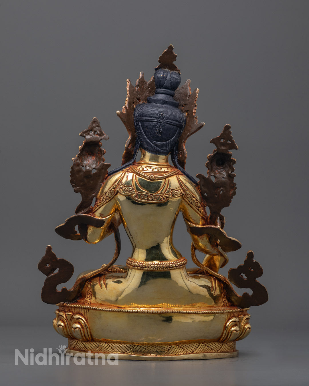 Detailed shot of lotus throne and ornate jewelry on premium hand-carved White Tara Sculpture