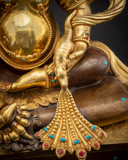 Detailed shot of mongoose Dzambhala statue spitting jewels for wealth and prosperity