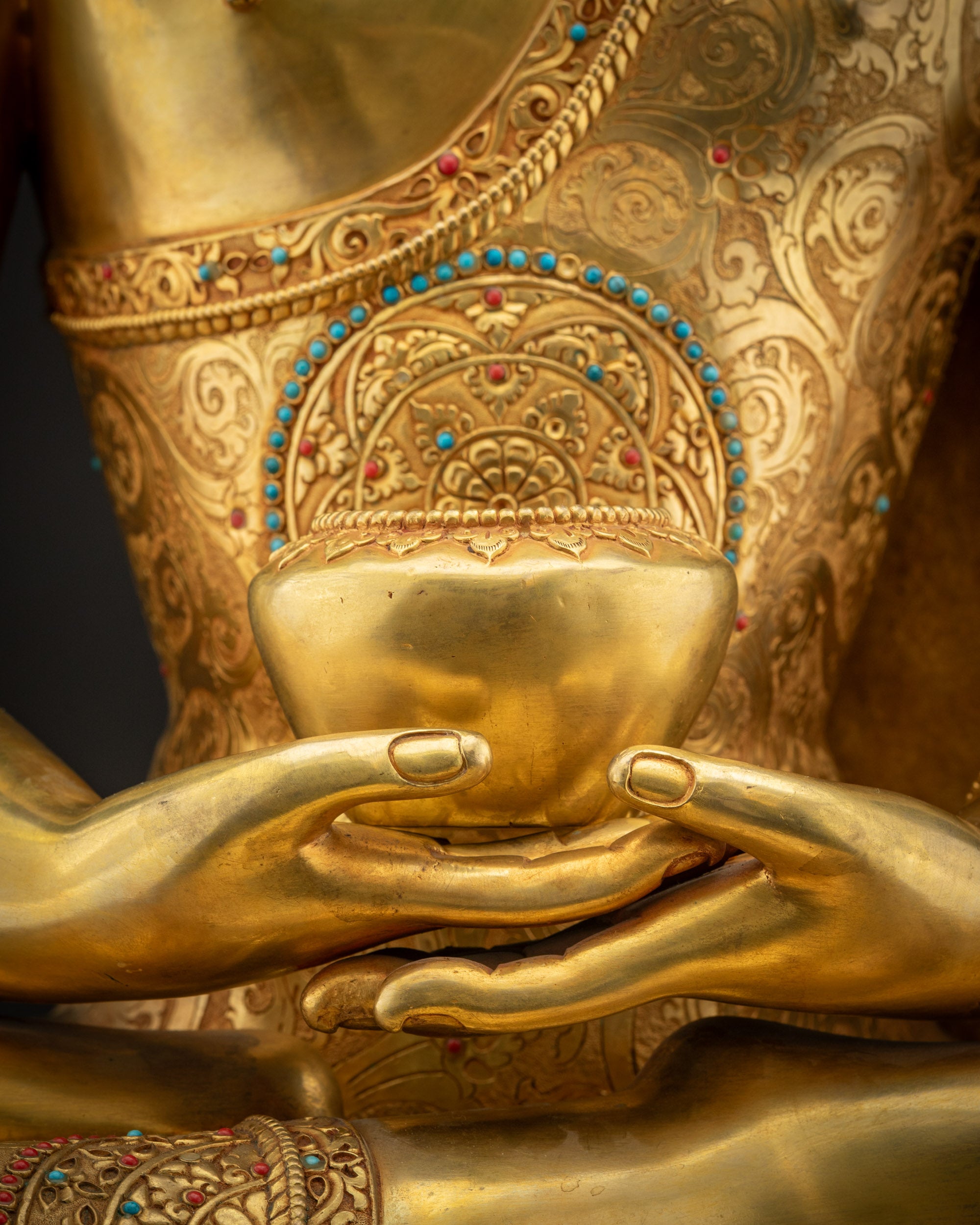 Detailed shot of monk’s bowl Amitabha Buddha sacred ritual decorative statue
