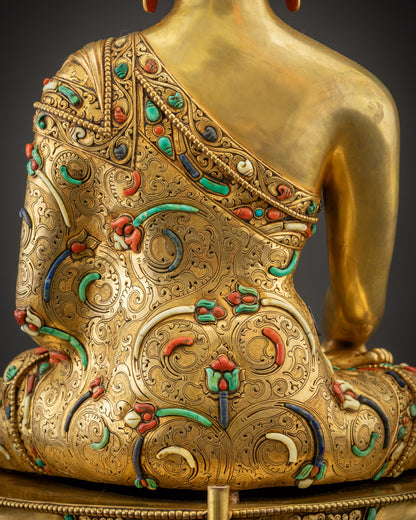 Detailed shot of robe and stones highlighting semi-precious gem inlays and golden contrast
