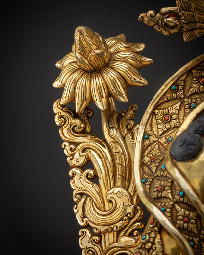 Detailed shot of utpala flower Green Tara holding sacred utpala lotus stem in hand
