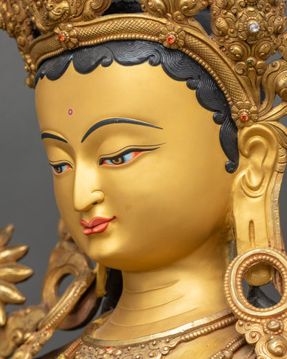 Detailed side close-up face of Green Tara sculpture with Five-Jewelled Crown
