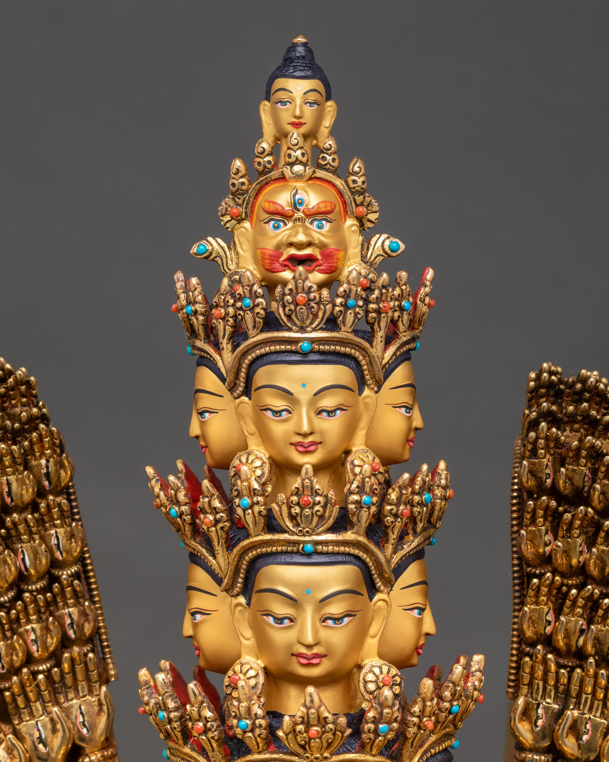 Detailed side close-up of Chenrezig face, showing serene expression, gold fire-gilding, and artisan copper craftsmanship