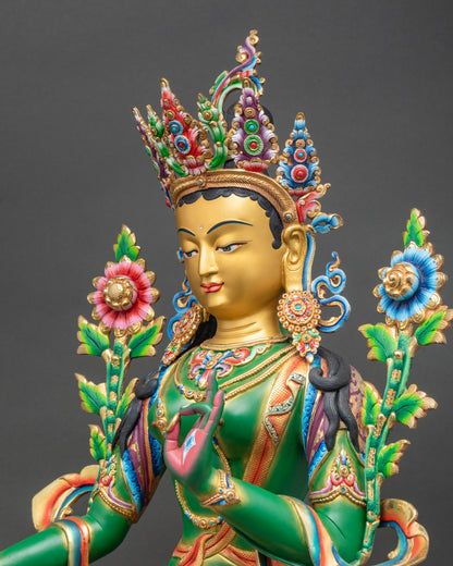 Detailed side close-up of Green Tara statue showing intricate thangka-inspired adornments
