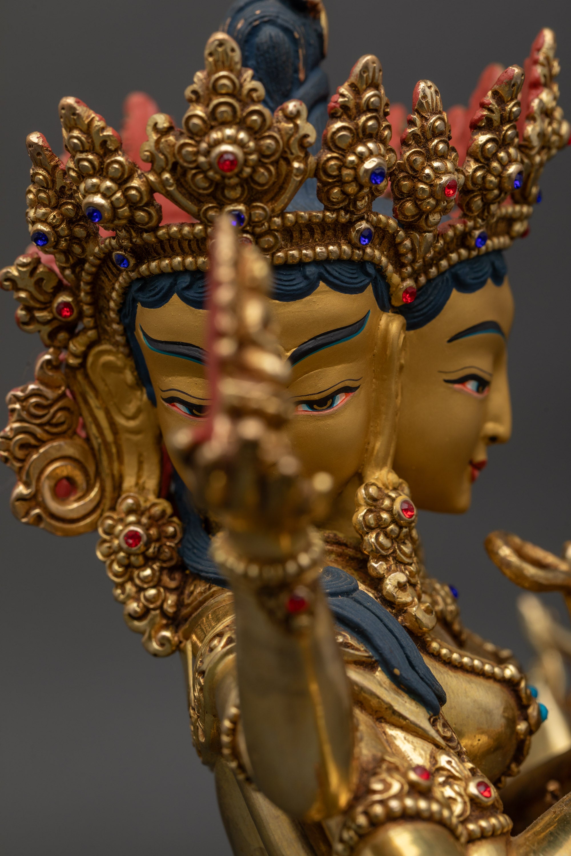 Detailed side close-up of Namgyalma statue, intricate carvings and semi-precious stones