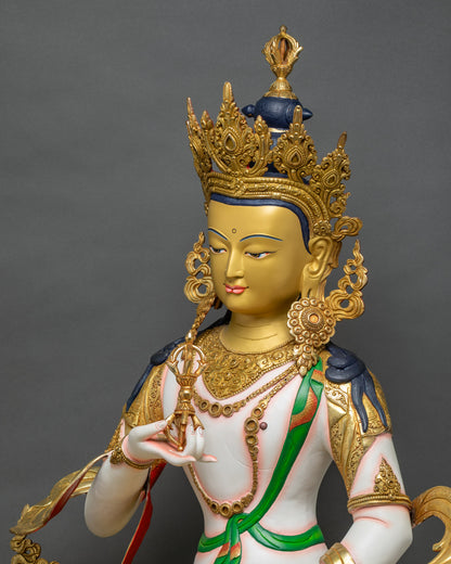 Detailed side close-up of Vajrasattva holding vajra and bell, showing gold and color layers