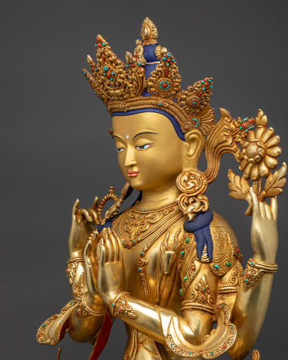 Detailed side close up Chenrezig Bodhisattva sculpture holding sacred objects