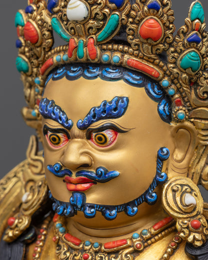 Detailed side close up Dzambhala crown and jewel-embedded ornaments