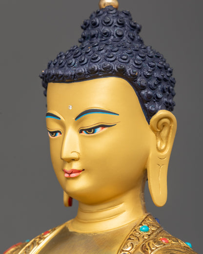 Detailed side close up face Shakyamuni Buddha calm expression with gold gilding details