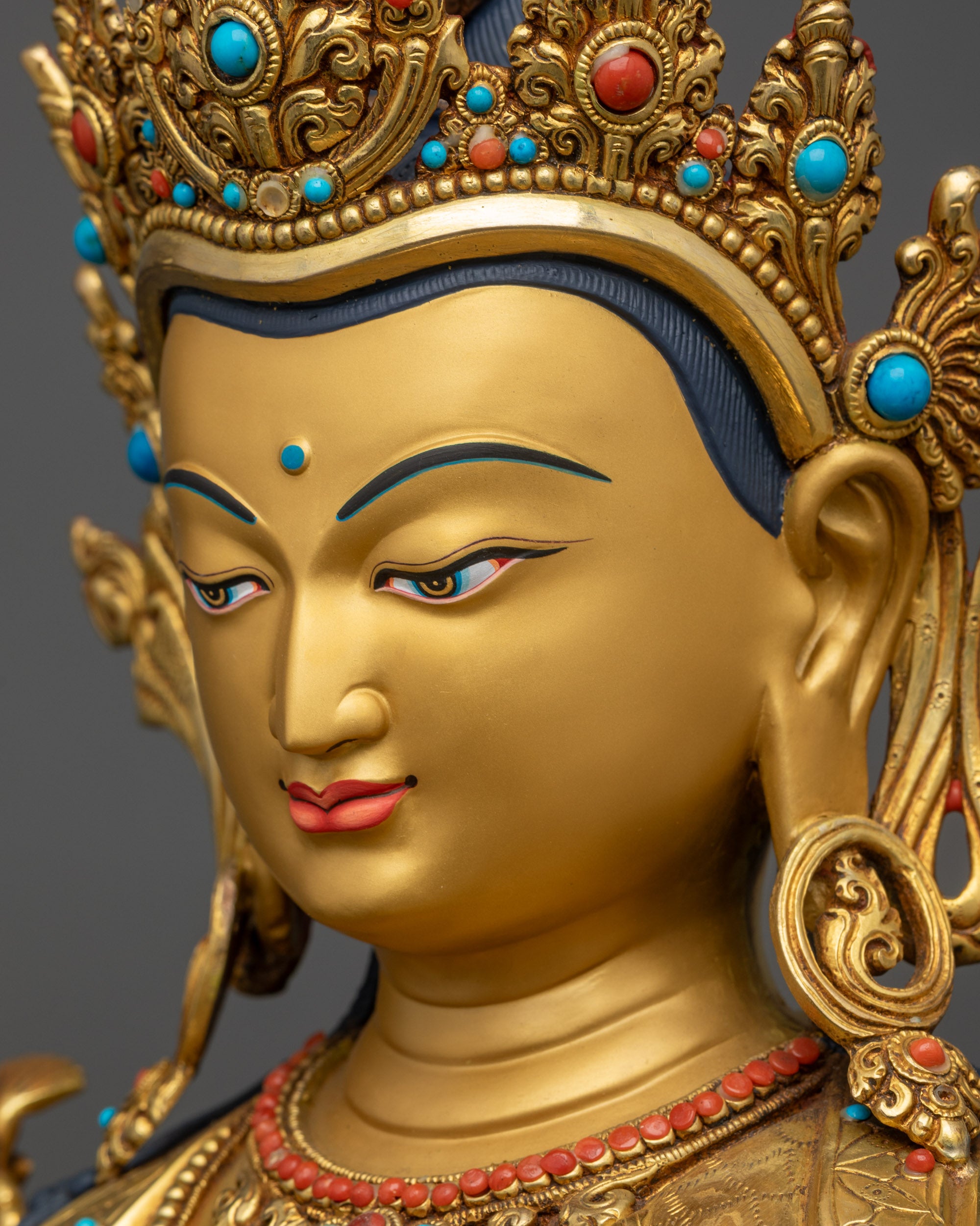 Detailed side close up face of Chenrezig with serene expression and crown
