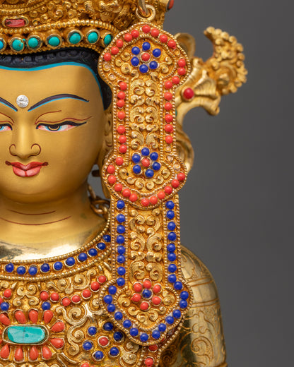 Detailed side close up face of Jowo Rinpoche Statue with jeweled crown and calm features