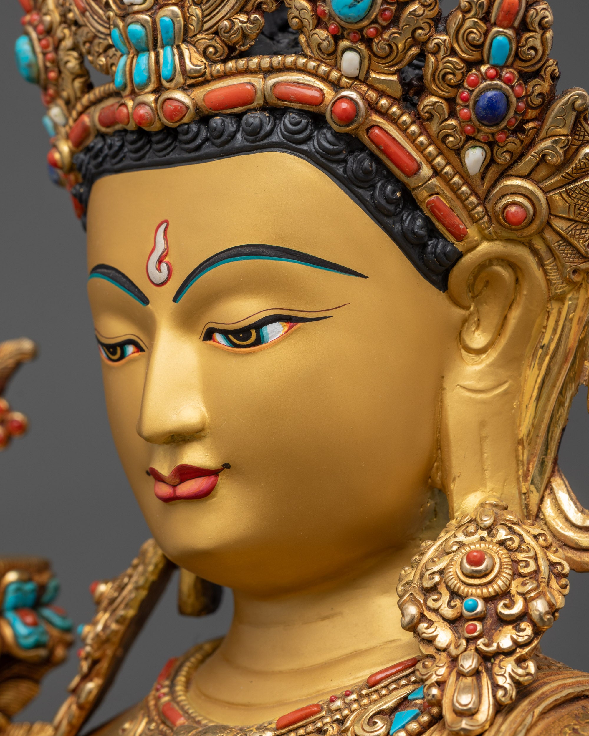 Detailed side close up face of Maitreya Buddha highlighting divine peaceful features