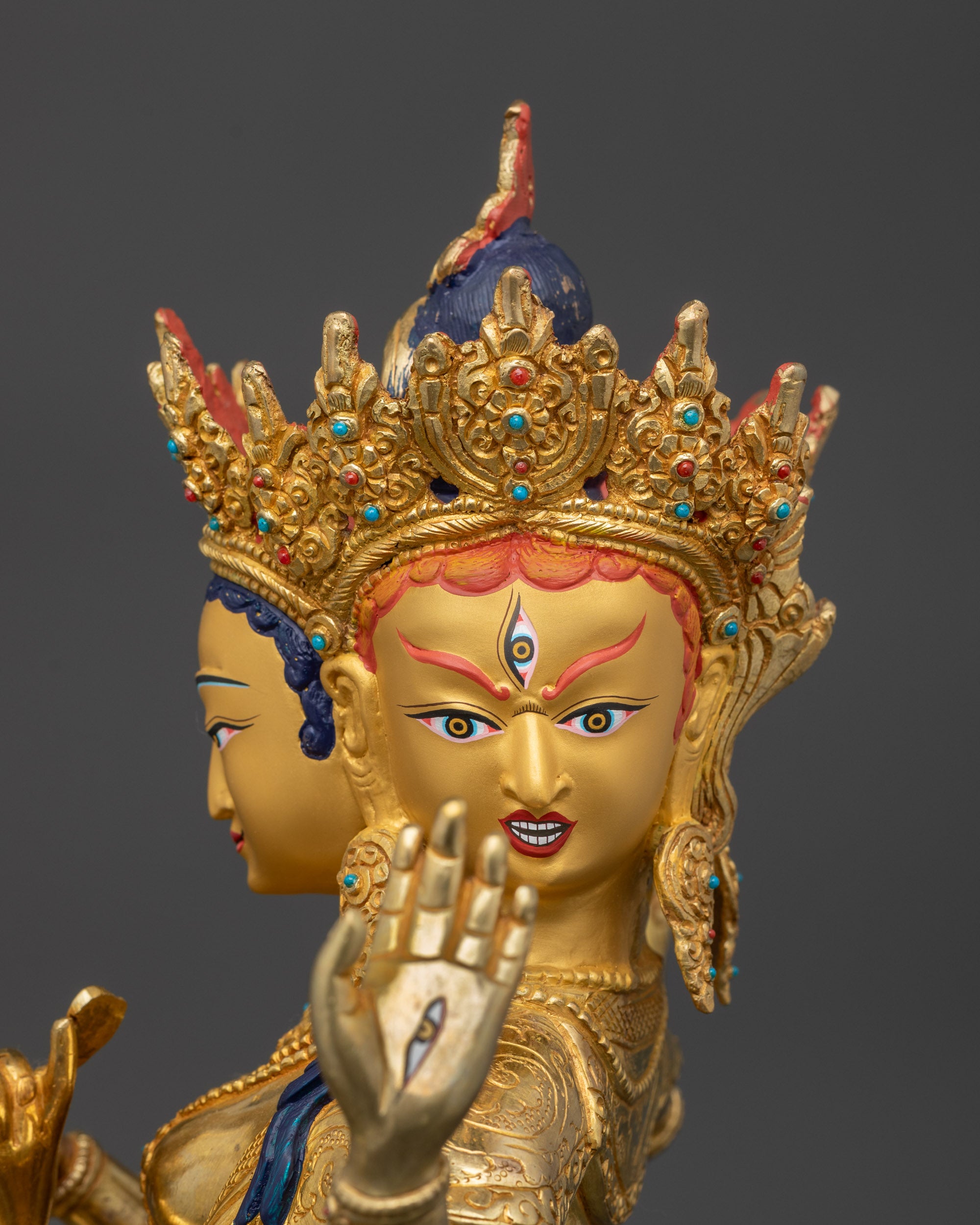 Detailed side close up face of Namgyalma with radiant gold-gilded surface and fierce look
