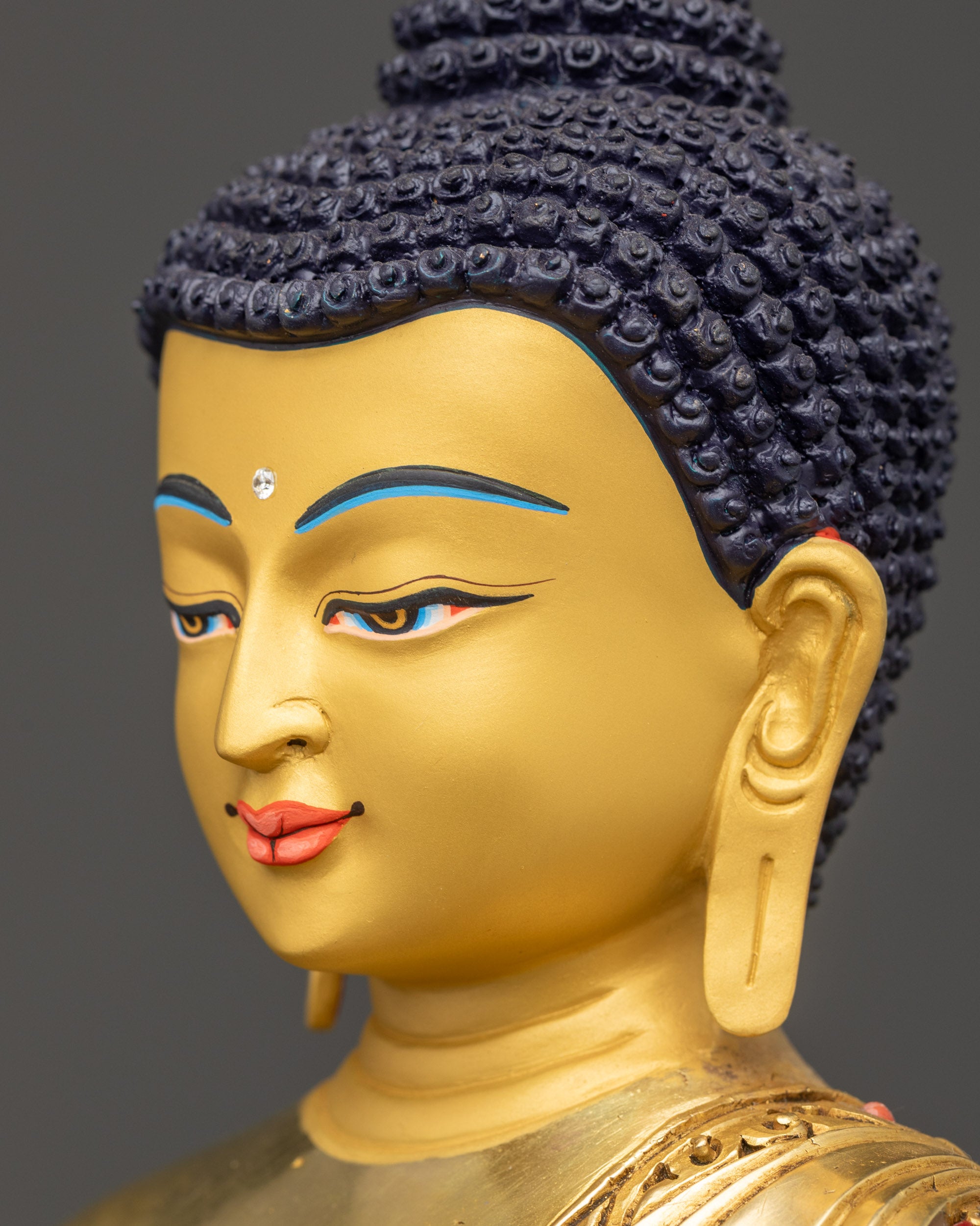 Detailed side close up face of Siddhartha Gautama Buddha statue for serene meditation space
