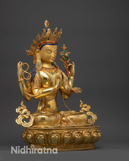Detailed side close up handcrafted Chenrezig statue with swirling robe carvings
