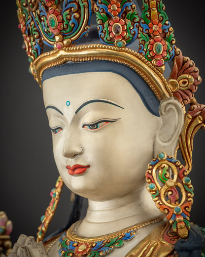 Detailed side close up of Chenrezig Bodhisattva face with hand-painted crown and features