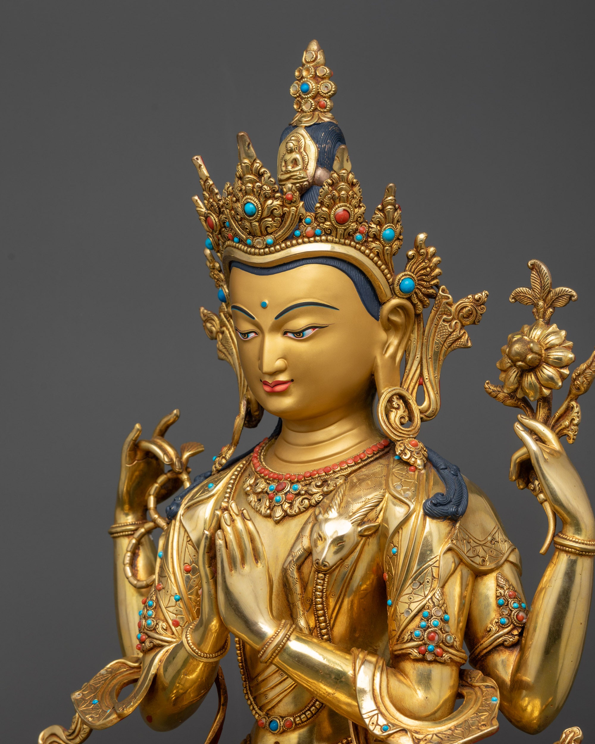 Detailed side close up of Chenrezig showing jeweled crown and lotus posture

