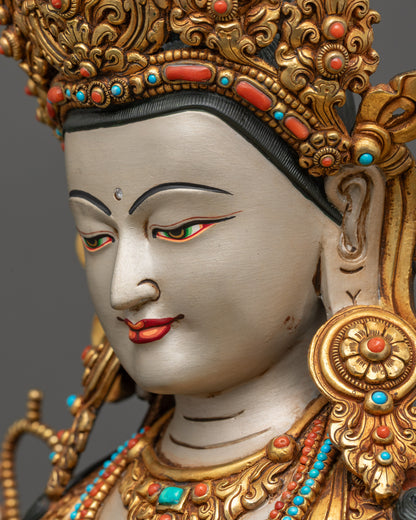 Detailed side close up of Chenrezig statue face showing serene compassionate expression