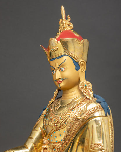 Detailed side close up of Guru Rinpoche Statue highlighting lotus hat and semi-precious stones