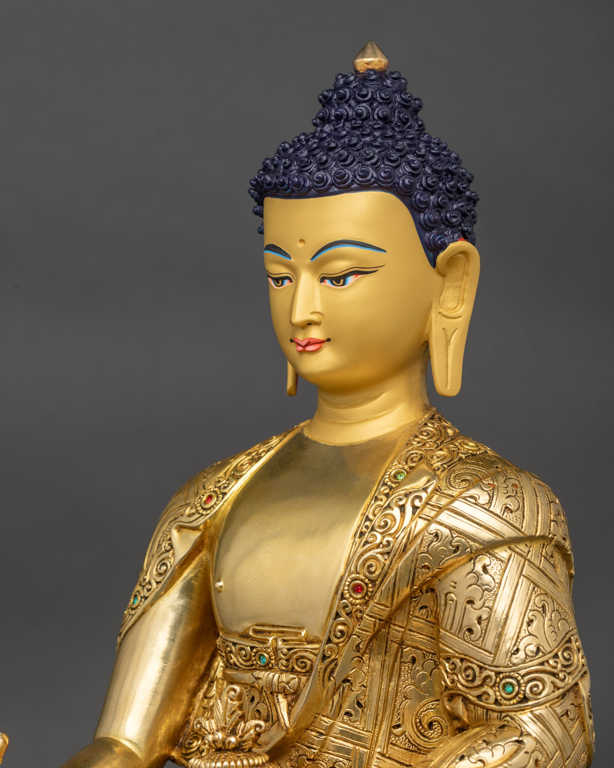 Detailed side close up of Medicine Buddha holding healing nectar bowl and Myrobalan plant