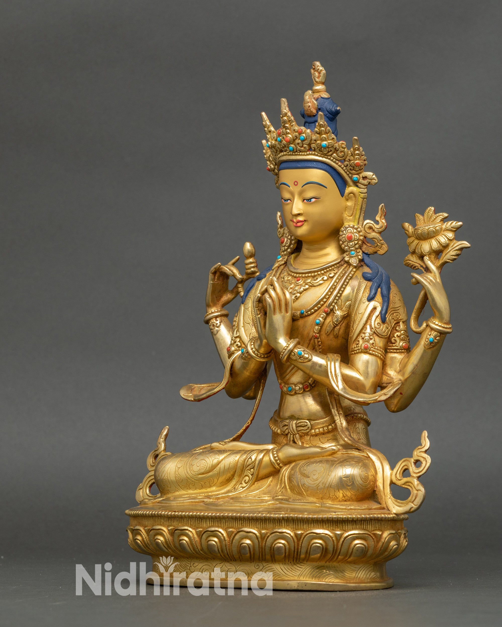 Detailed side face of Chenrezig Bodhisattva, handcrafted Nepalese gold meditation statue