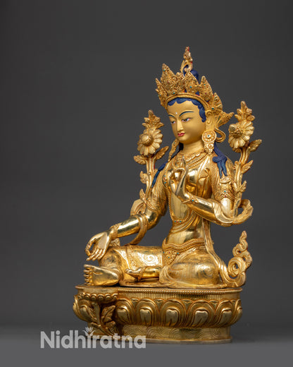 Detailed side view of Green Tara statue with carved lotus seat and flowing robe
