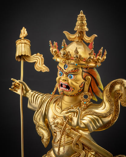 Detailed side view of Nechung Chuyong Statue highlighting gold fire-gilded body