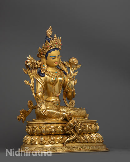 Detailed side view of Nepalese Green Tara Statue showing intricate lotus base