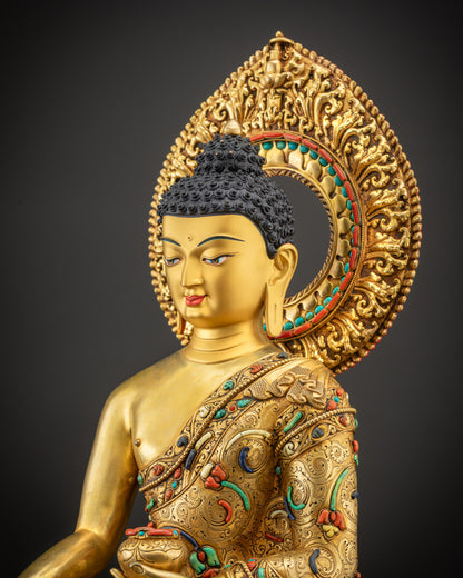 Detailed side view of Shakyamuni Buddha statue revealing robe carvings and halo ornaments
