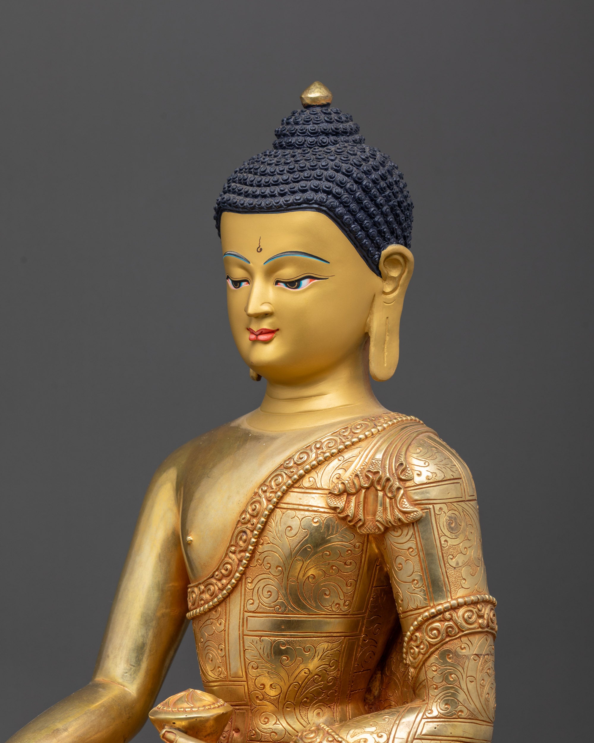 Detailed side view of Siddhartha Gautama Buddha statue seated on lotus base
