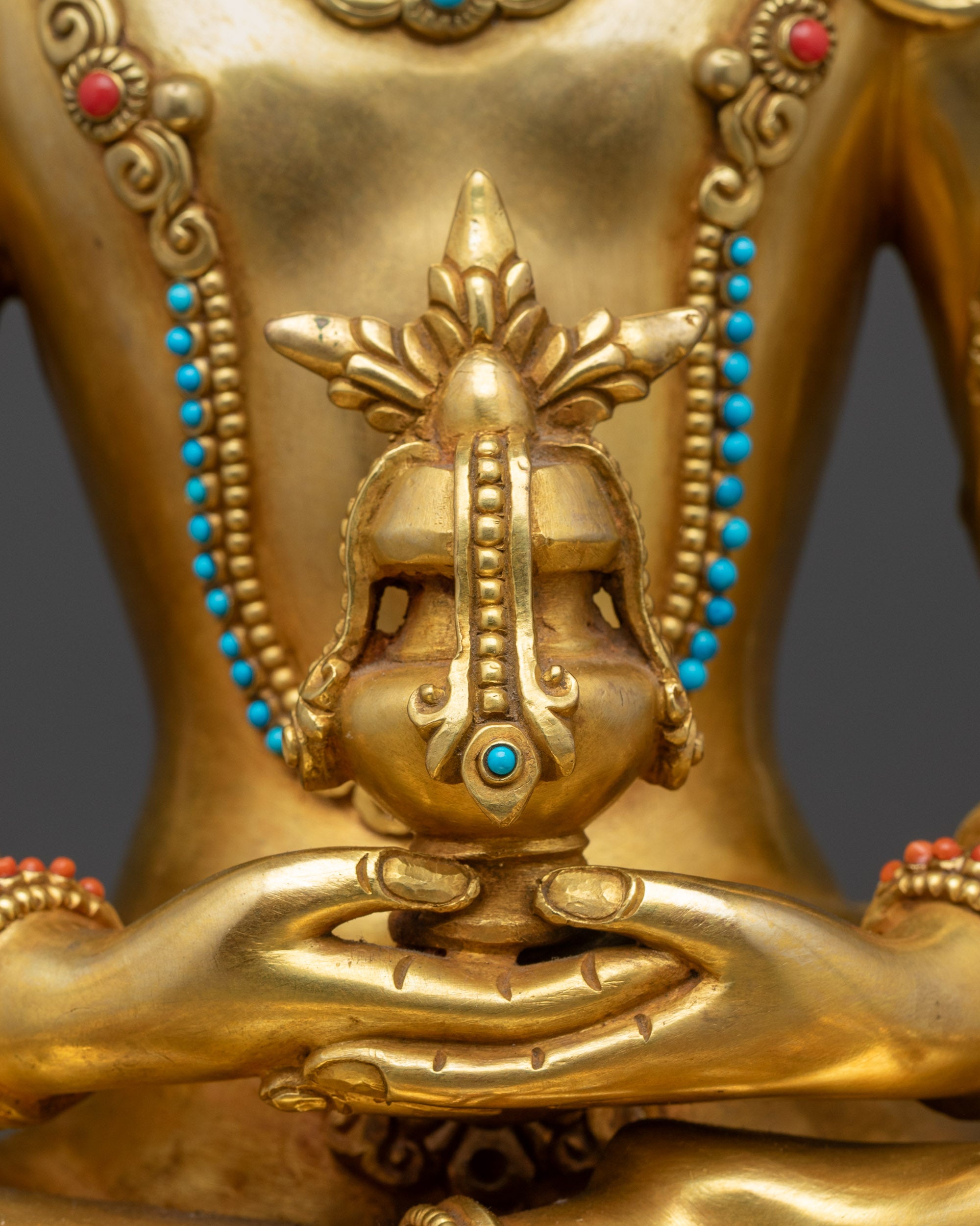 Detailed view Amitayus Buddha statue holding vase of immortal nectar lotus posture
