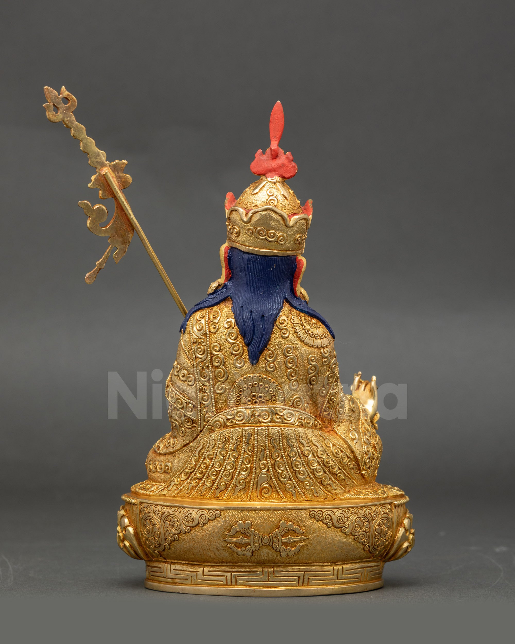 Detailed view of 24K gold fire-gilding on copper Padmasambhava sculpture