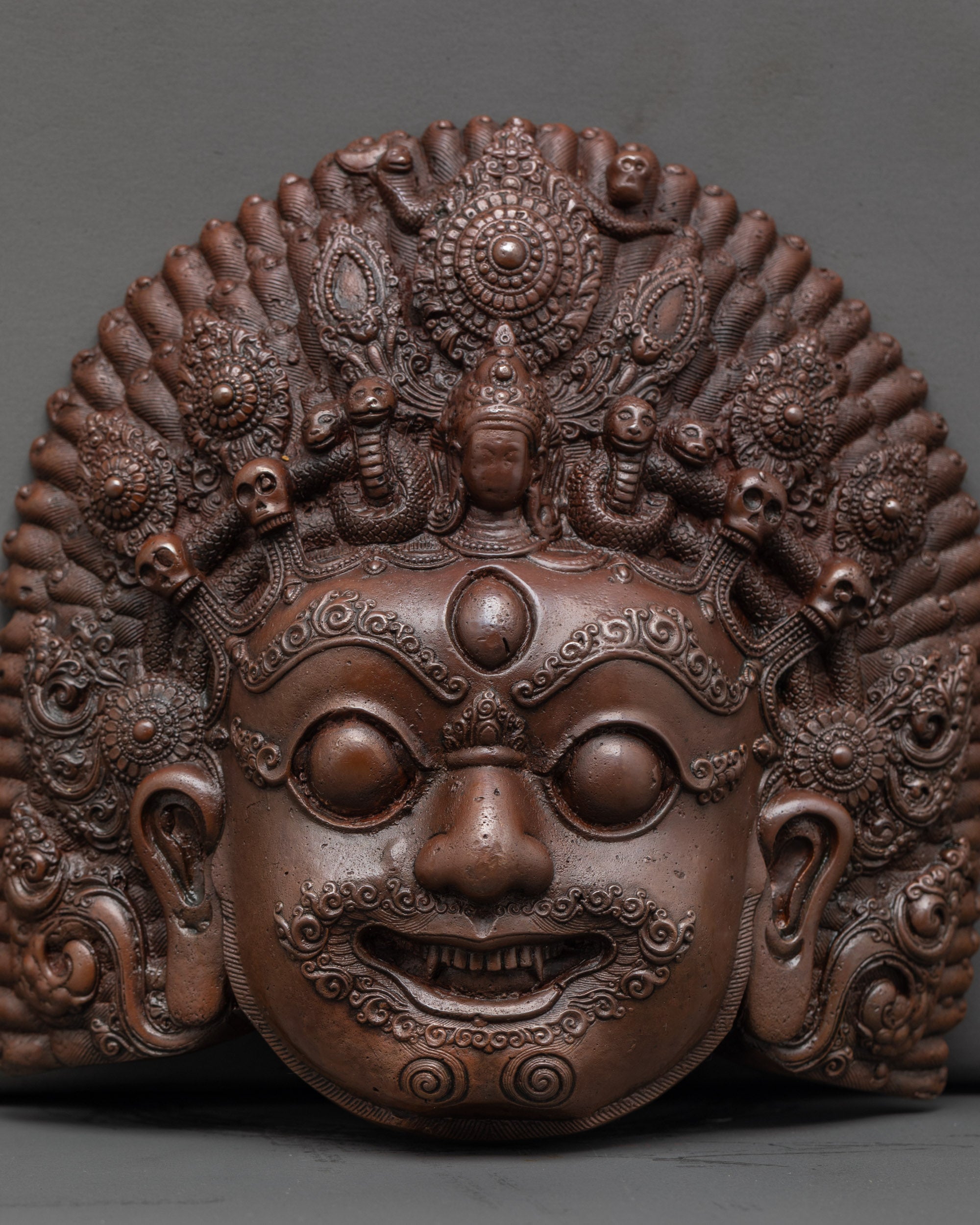Detailed view of Bhairav Mask highlighting crown ornaments, third eye, and fine carvings