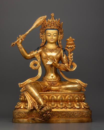 Divine Manjushri statue seated on double lotus throne with flaming wisdom sword
