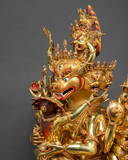 Face detail of Vajrabhairava Union Statue with gold-painted expression and sacred ornaments
