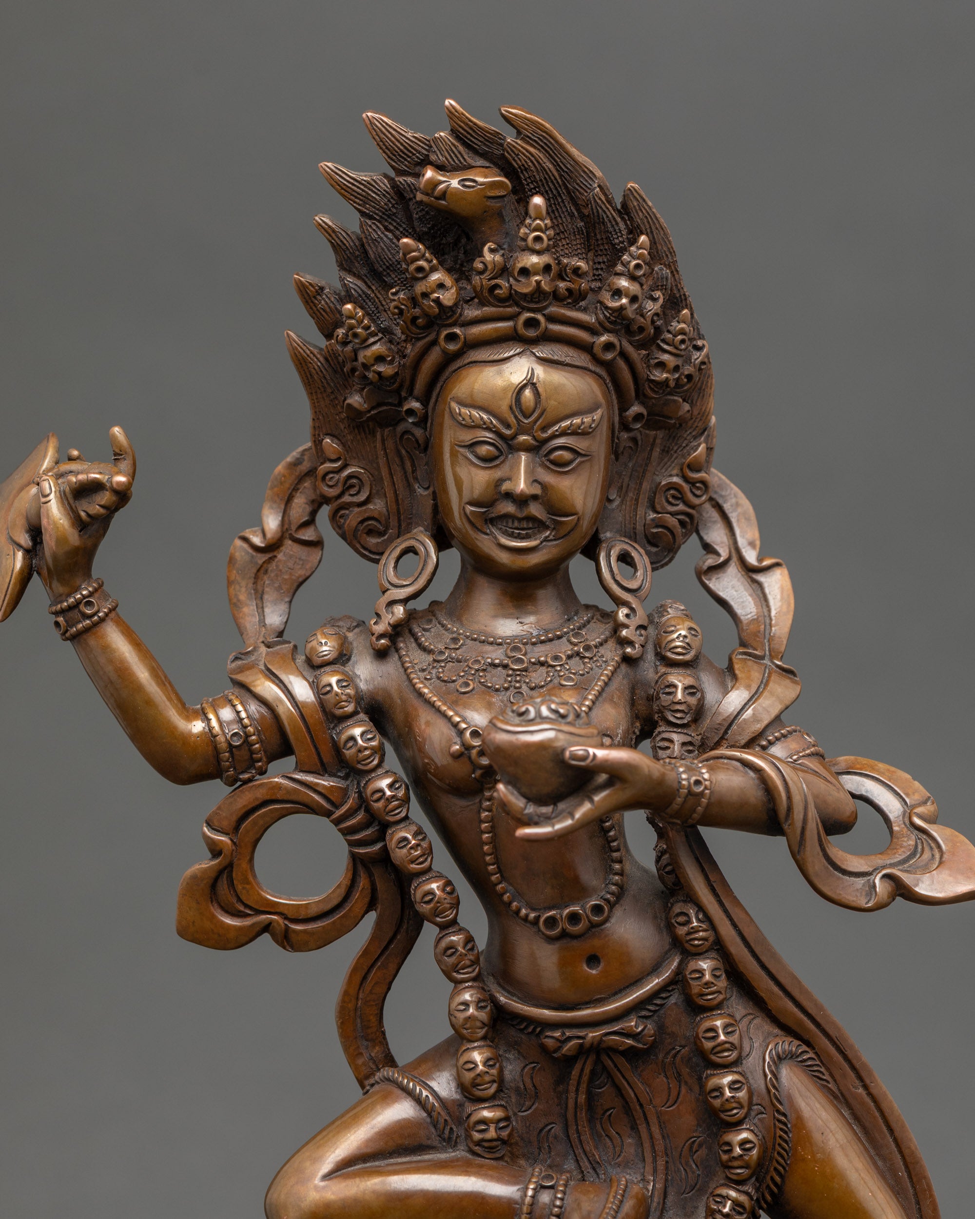 Dorje Phagmo wrathful face holding curved ritual knife, handcrafted Newari art